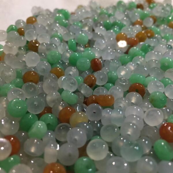 small clear genuine natural jadeite donut shape bead - Image 3