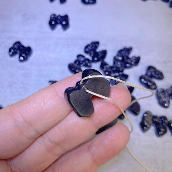 nice bow-knot shape obsidian bead - Image 7