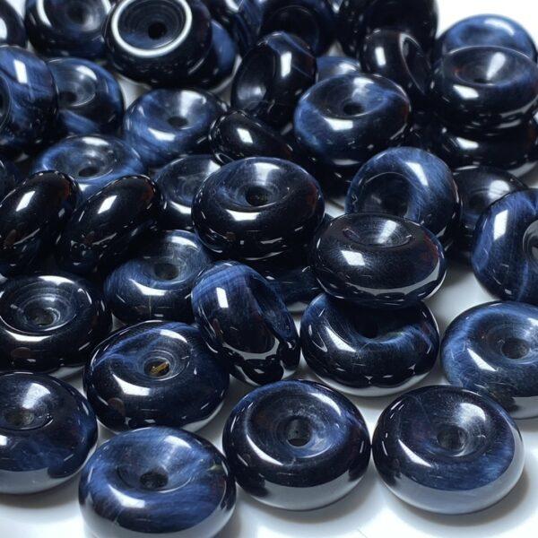 nice donut shape blue tigerite stone bead