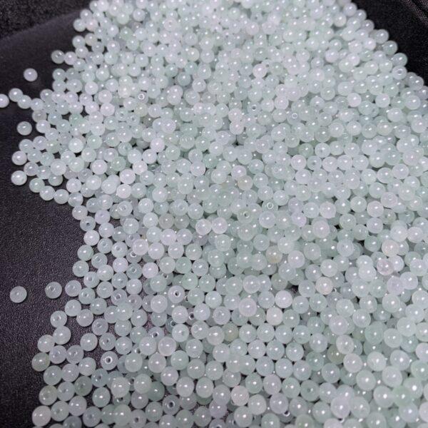 small round shape natural icy white and light green jadeite bead - Image 3