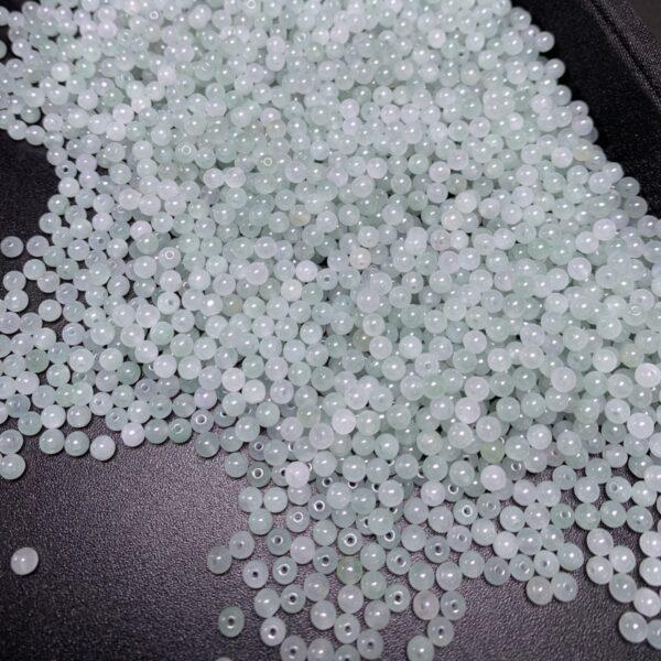 small round shape natural icy white and light green jadeite bead - Image 4