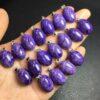 simple oval natural Charoite charm