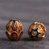 hollow flower pattern oval shape gild sterling silver bead, red enamel bead