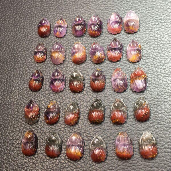 Lying nine-tailed fox shape natural auralite charm - Image 2