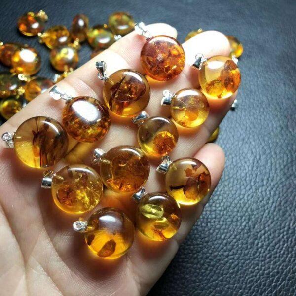 oblate shape small natural flower amber bead sterling silver charm