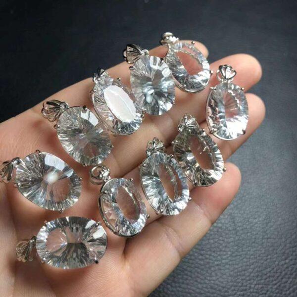 facet surface oval shape natural clear quartz bead inlaid sterling silver charm