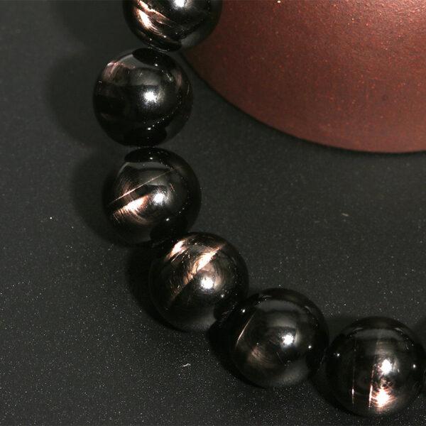 7mm - 14mm round shape 7A natural Hypersthene beaded bracelet - Image 4