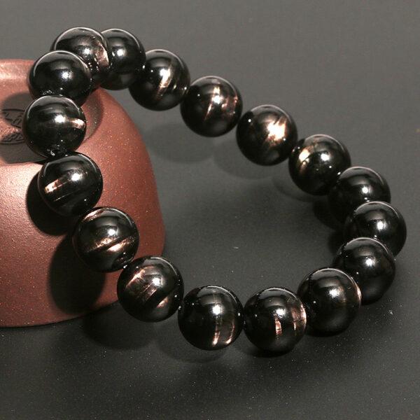 7mm - 14mm round shape 7A natural Hypersthene beaded bracelet - Image 5