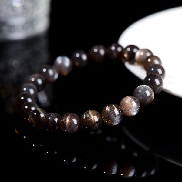 6 - 9mm round shape 7A genuine natural black gold sun stone beaded bracelet - Image 2
