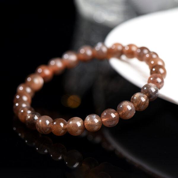 7 - 9mm round shape 7A genuine natural black gold sun stone beaded bracelet - Image 2