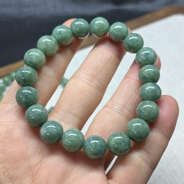 8mm - 13mm round shape natural oily green jadeite beaded bracelet - Image 2