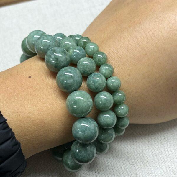 8mm - 13mm round shape natural oily green jadeite beaded bracelet - Image 3