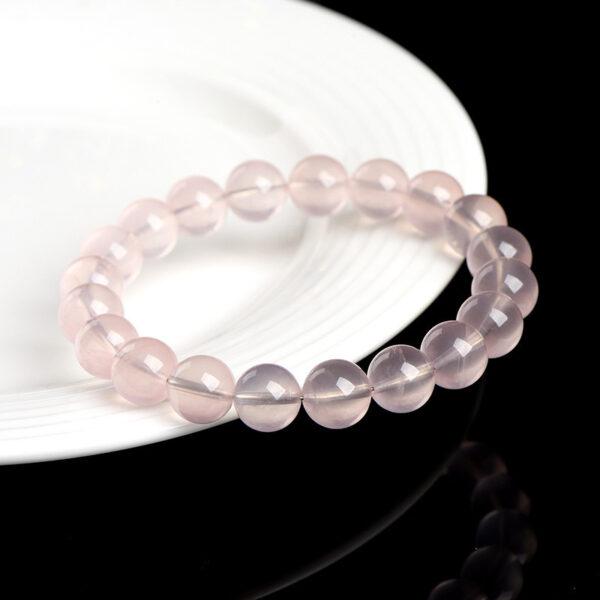 6mm - 14mm round shape star light natural Mozambique rose quartz beaded bracelet - Image 4