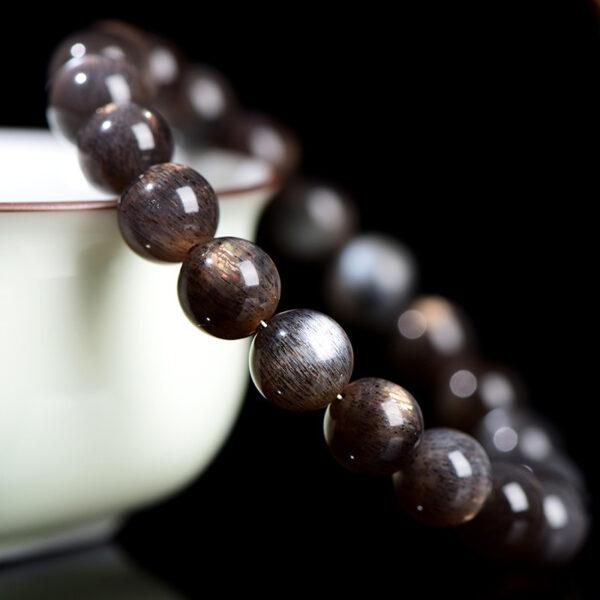 6 - 9mm round shape 7A genuine natural black gold sun stone beaded bracelet - Image 4