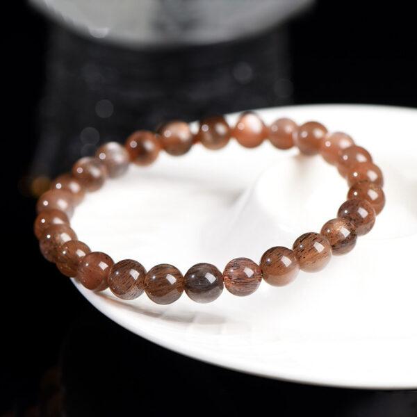 7 - 9mm round shape 7A genuine natural black gold sun stone beaded bracelet - Image 4