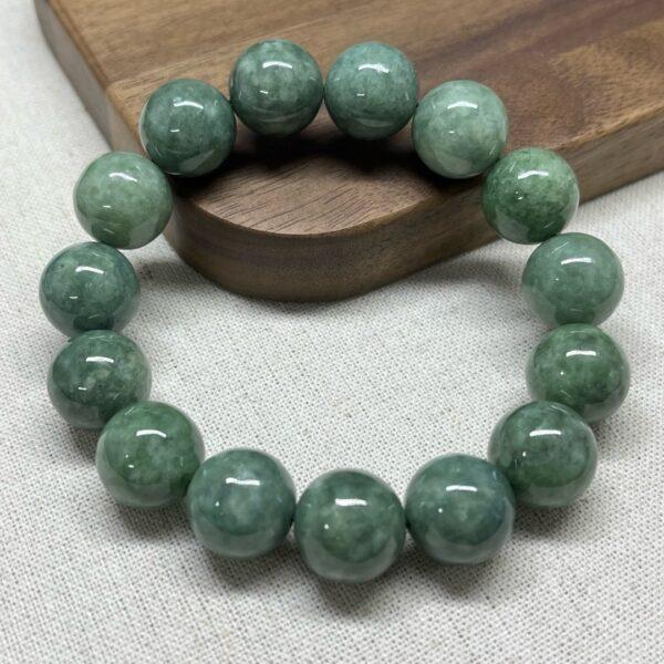 8mm - 13mm round shape natural oily green jadeite beaded bracelet - Image 4