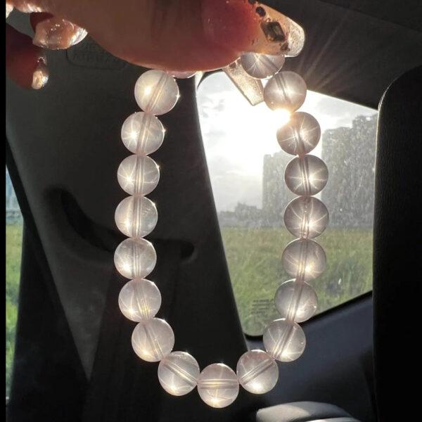 6mm - 14mm round shape star light natural Mozambique rose quartz beaded bracelet - Image 6
