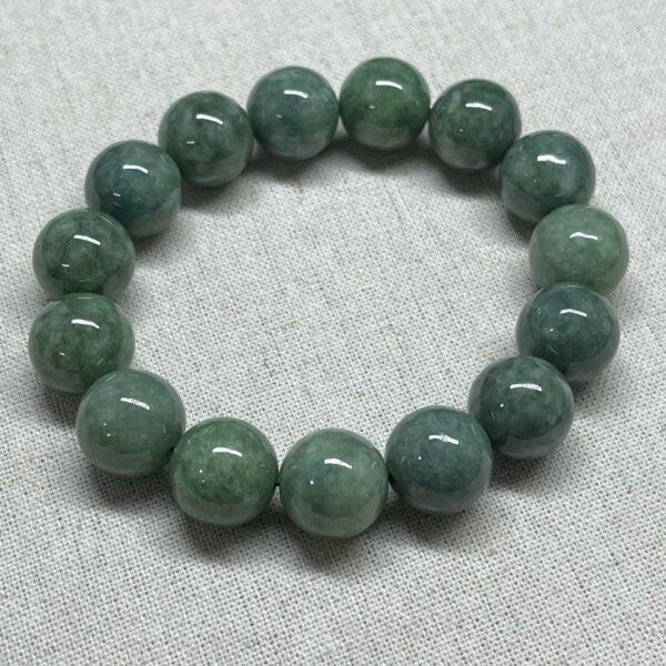 8mm - 13mm round shape natural oily green jadeite beaded bracelet - Image 7