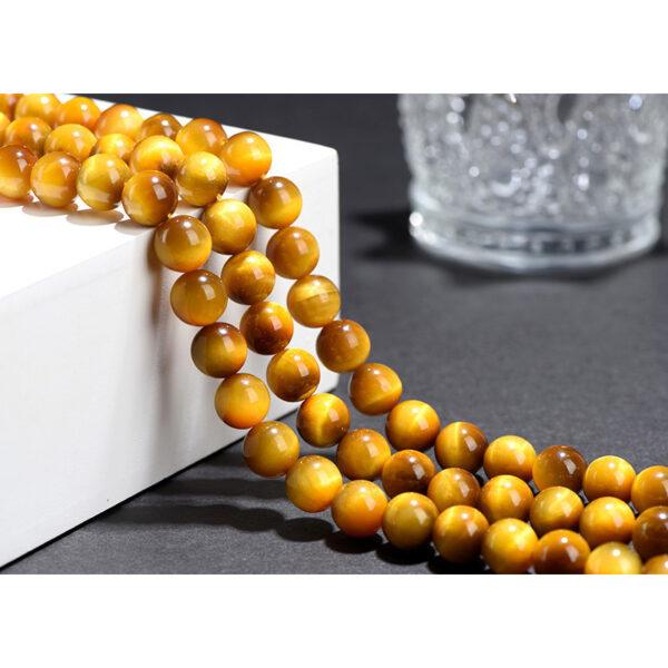 4mm - 6mm whole strand round shape 6A genuine natural golden tiger's eye stone bead - Image 2