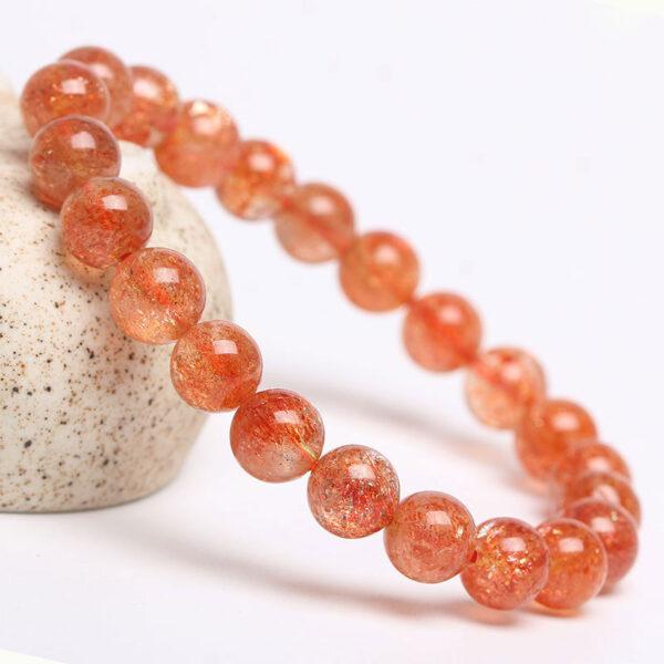 7A golden light genuine natural sunstone bracelet, 6 - 12mm round shape beaded bracelet - Image 2