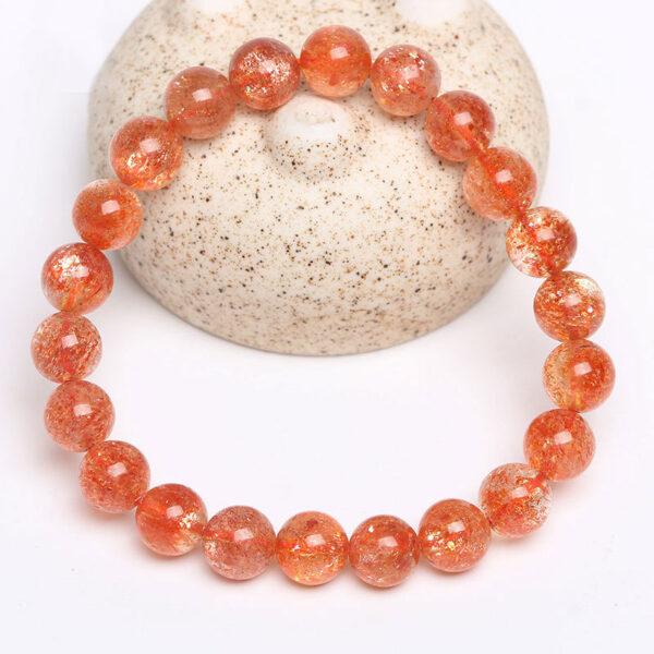 7A golden light genuine natural sunstone bracelet, 6 - 12mm round shape beaded bracelet - Image 3